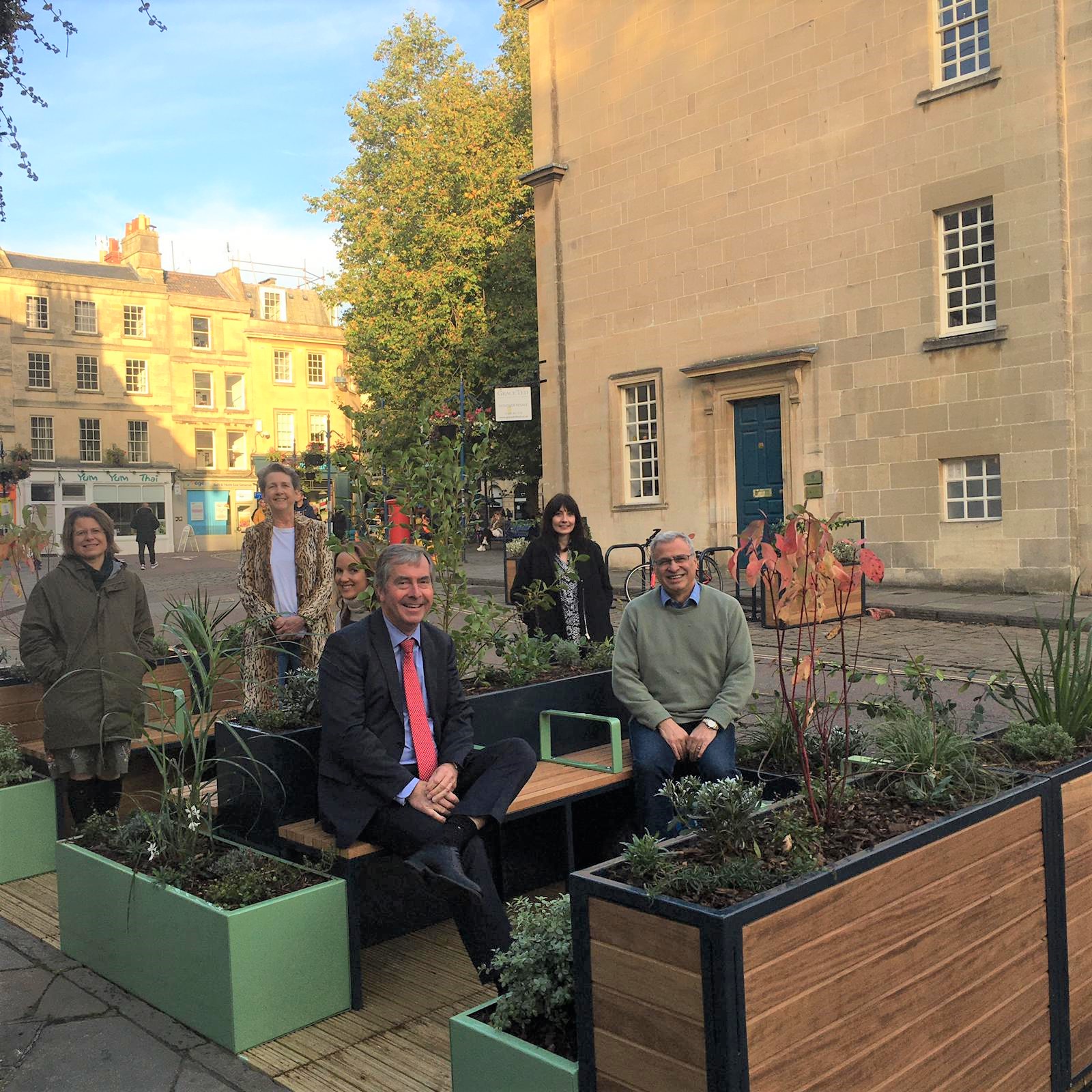 Councillors and local business leaders try out new parklet