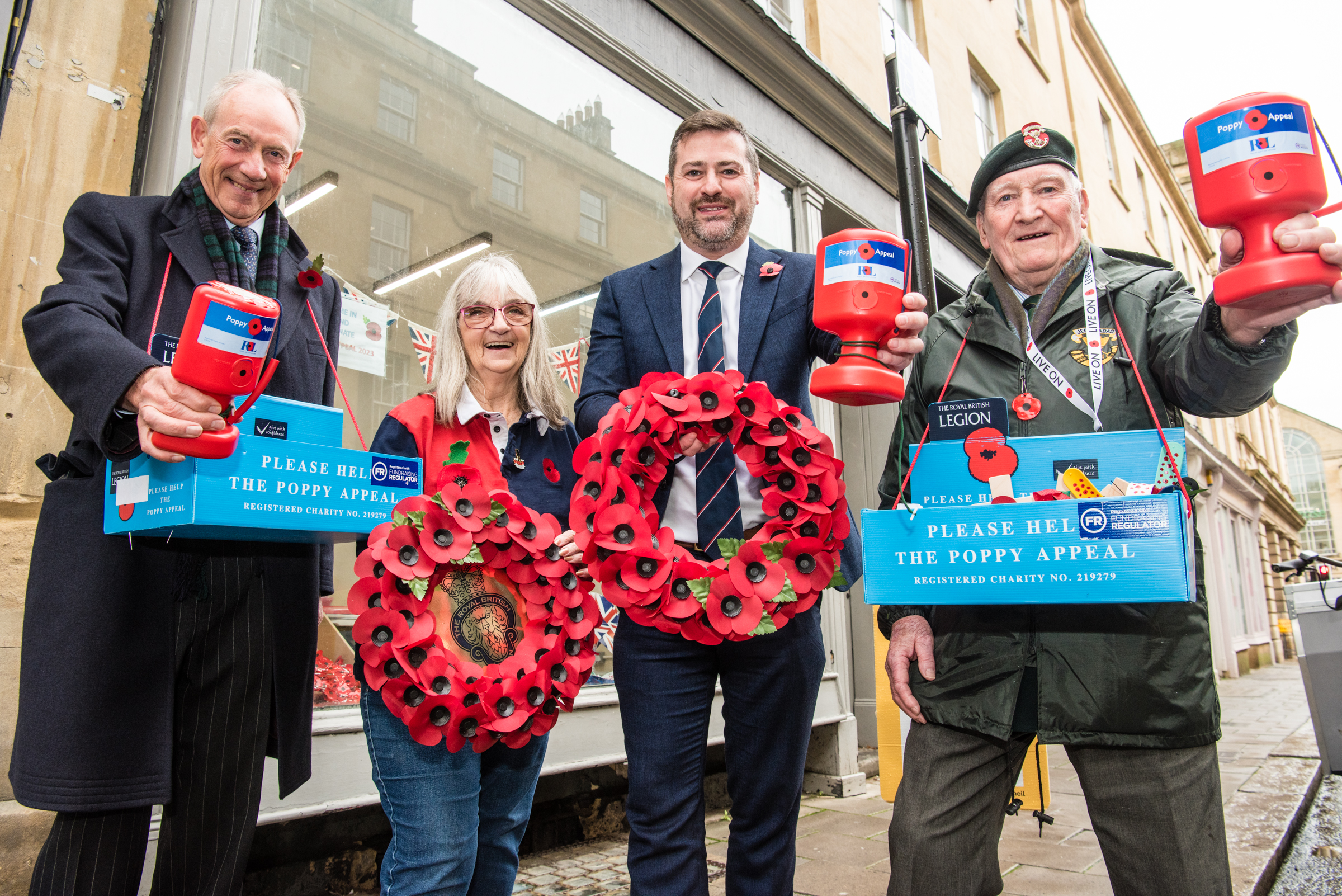 Cllr Kevin Guy with Poppy seller volunteers