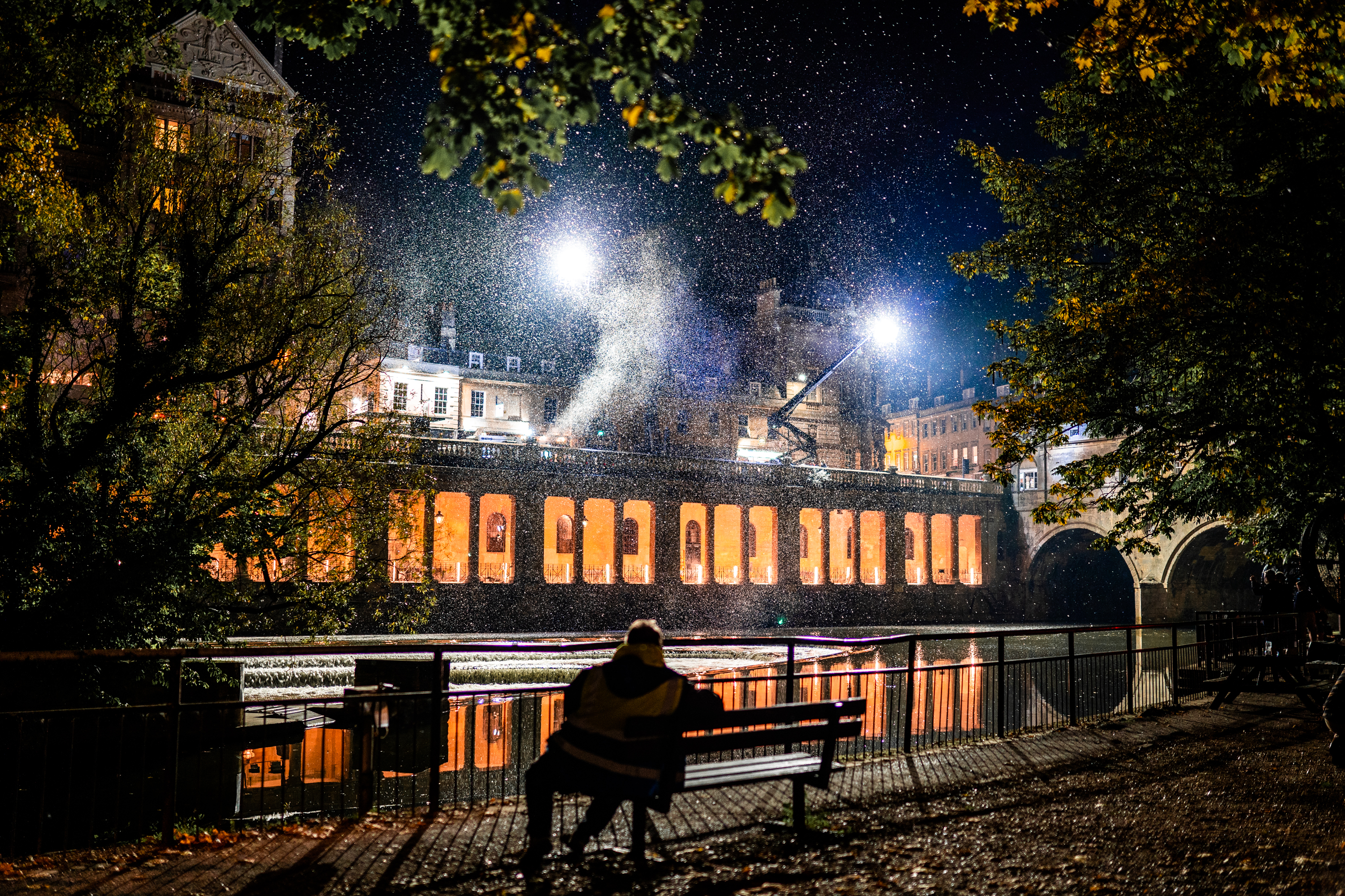 images shows a  Wonka film set at night  on location in Bath looking from the River Avon to Grand Parade copyright Jamie Bellinger   