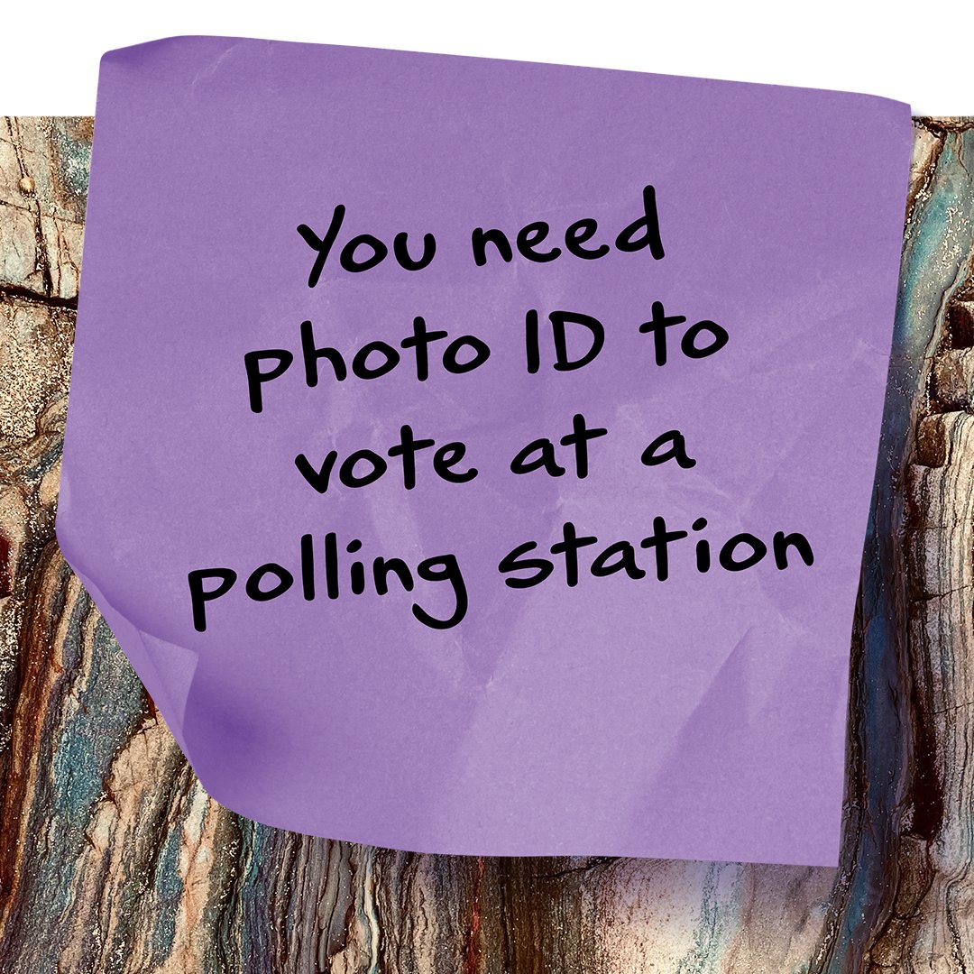 You need photo ID to vote at a polling station written on a post-it note.