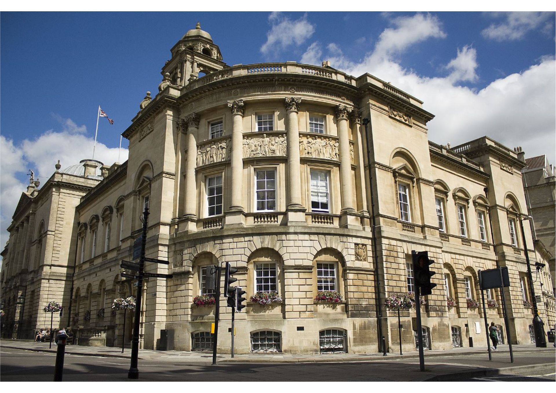 a photo of the Guildhall a Georgian building in Bath, with a blue, cloudy sky.