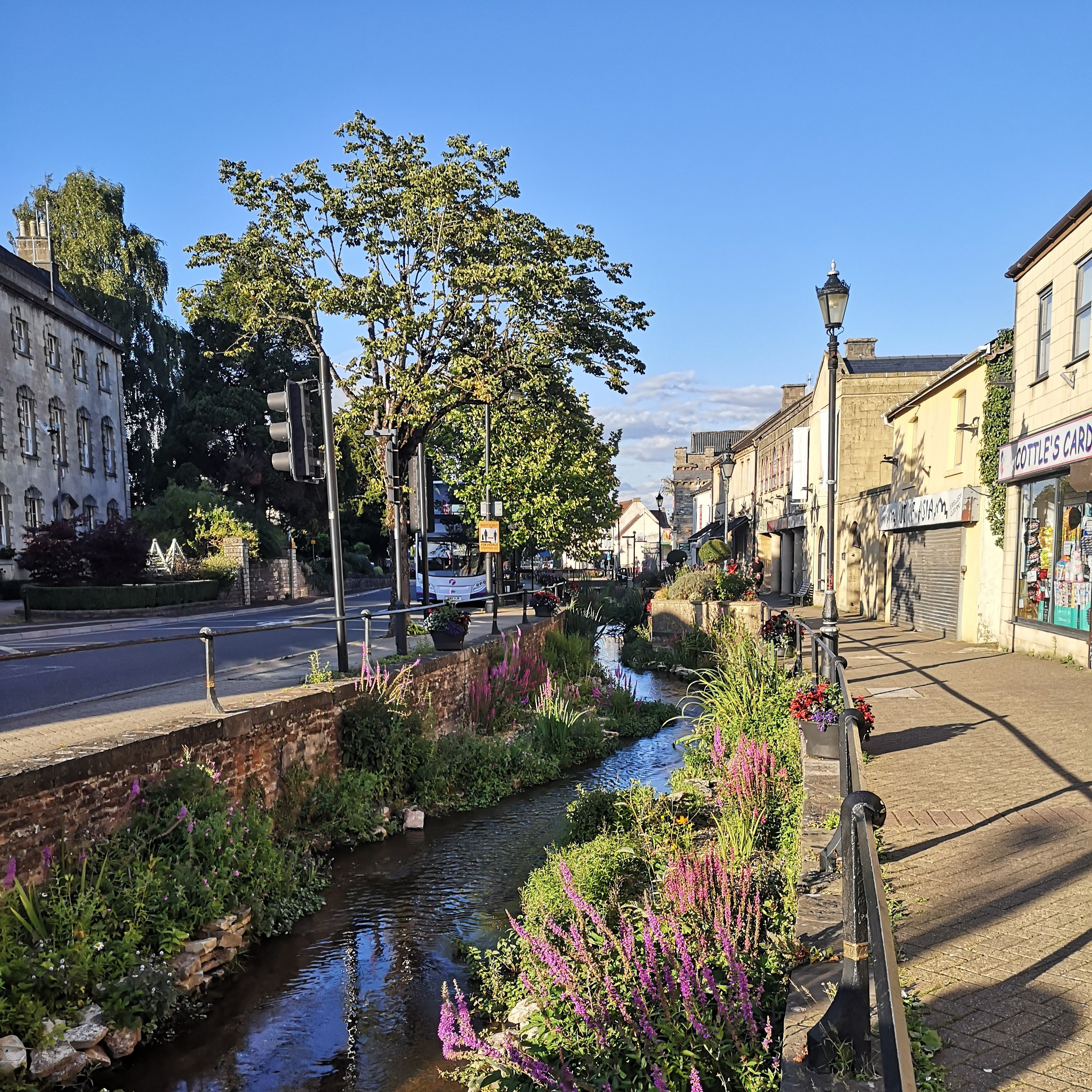 The riverside in Midsomer Norton town centre on a sunny day