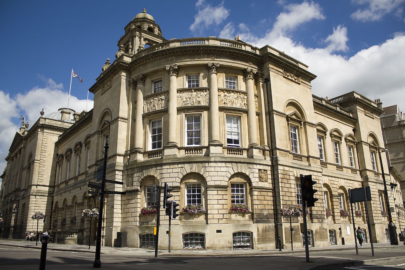 The Guildhall in Bath with blue skies and white clouds behind