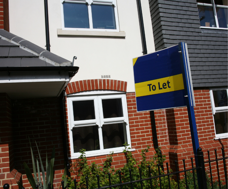 house with to let sign outside