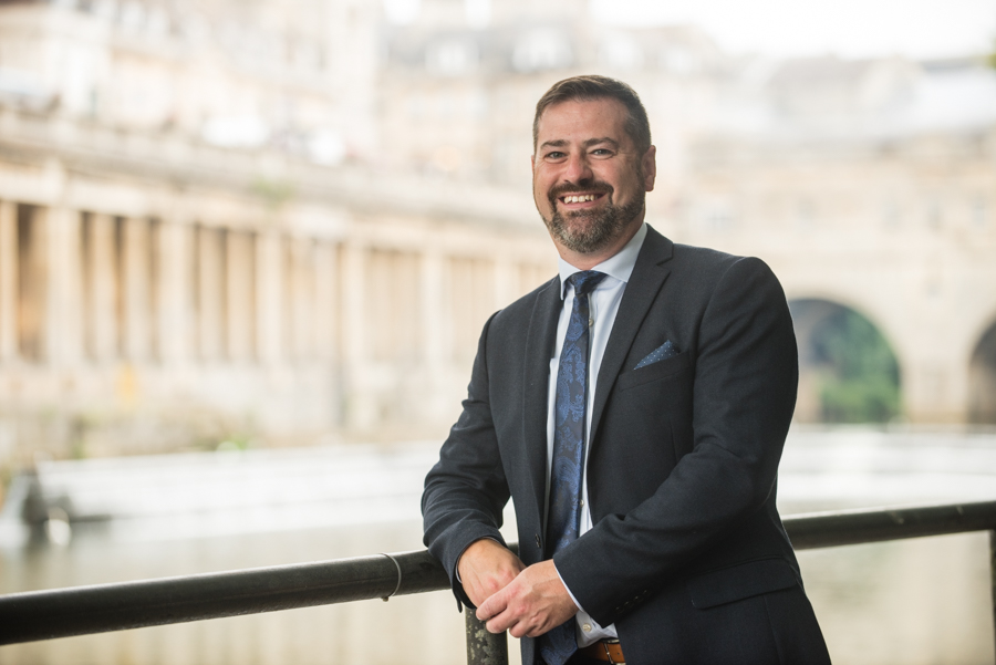 image is of Councillor Kevin Guy in front of Bath's historic Pulteney weir Bridge