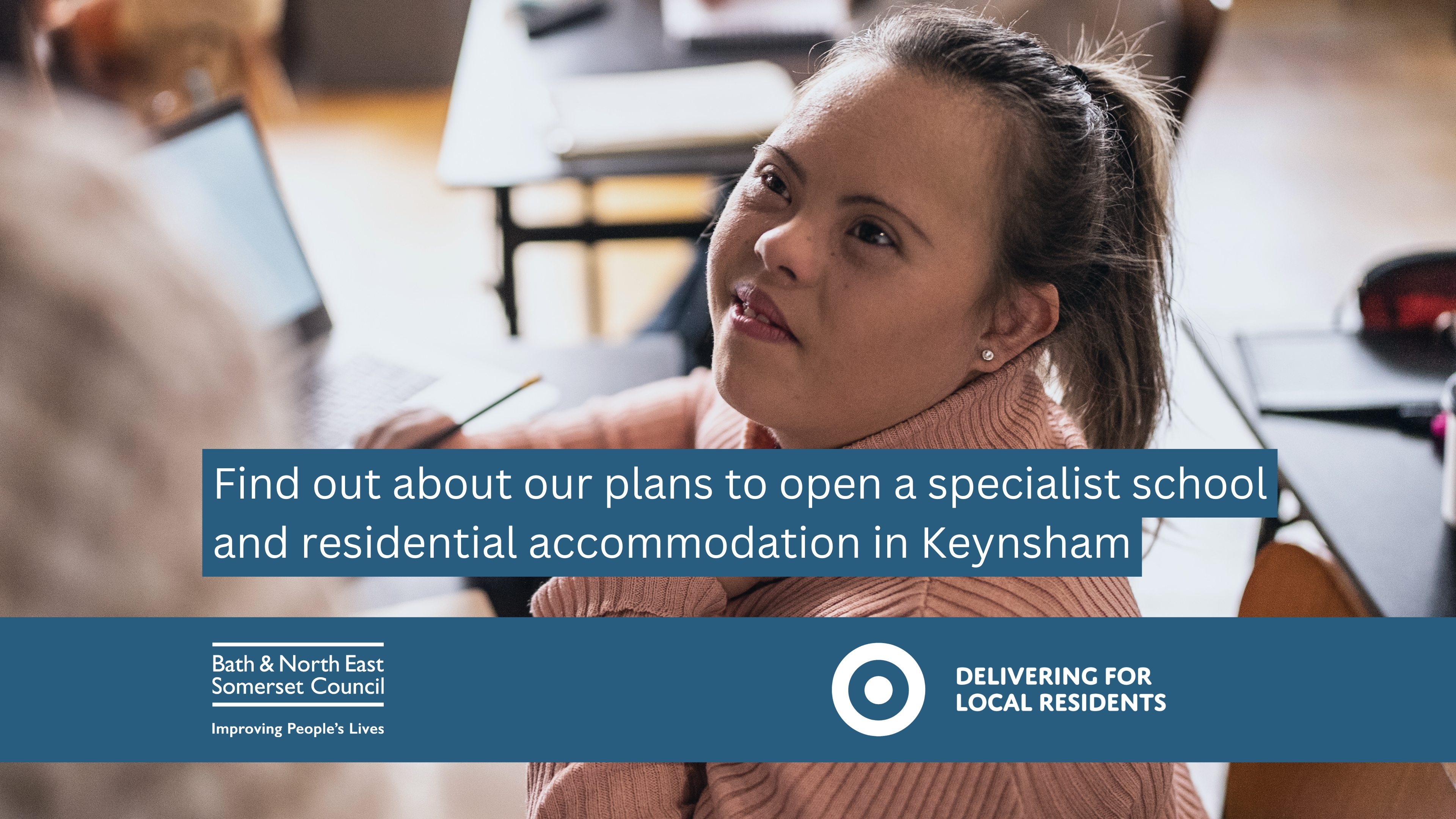 image shows a teenage girl in a classroom  
