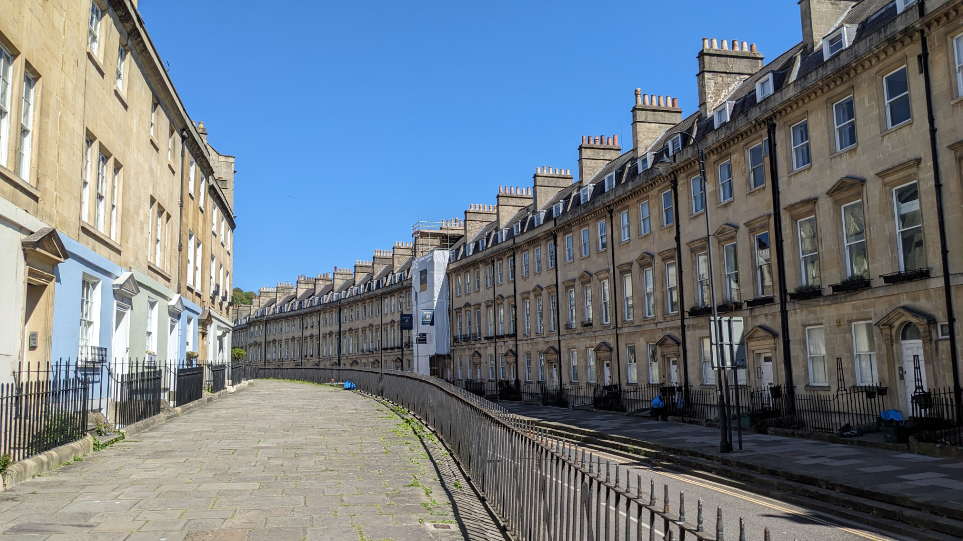 a row of Georgian houses with a blue sky