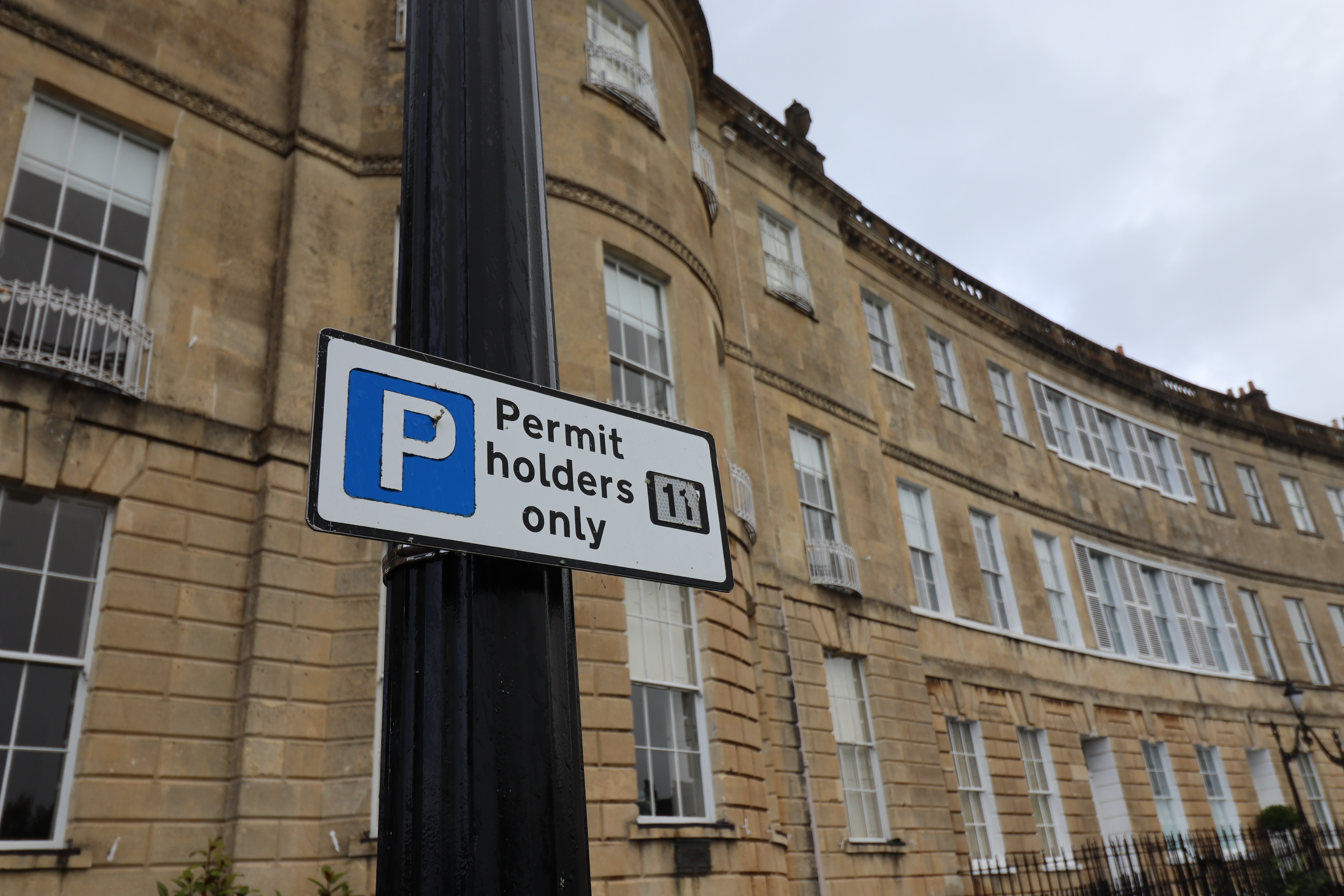 A 'parking permit only' sign. 