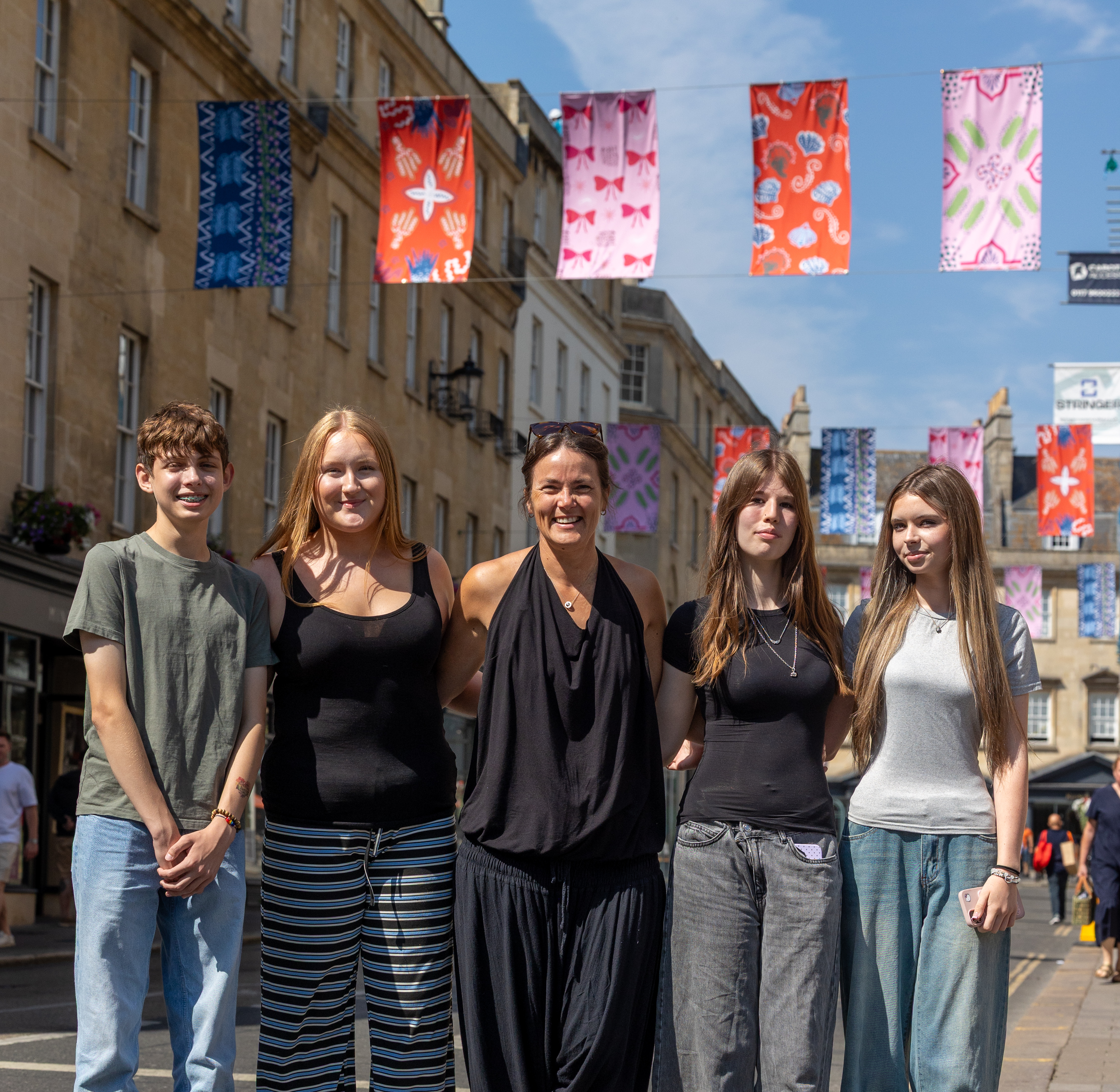 Students and teacher from LIFT Broadlands with their banners in New Bond Street
